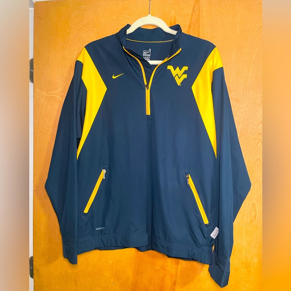 WVU Nike fitstorm gold and blue mens small pullover jacket. Excellent condition.